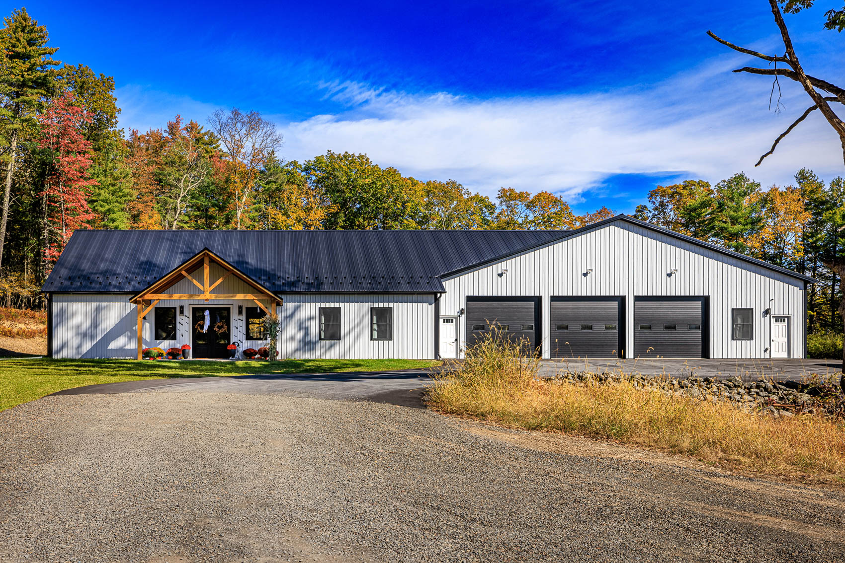 White custom garage and shop building with bay doors